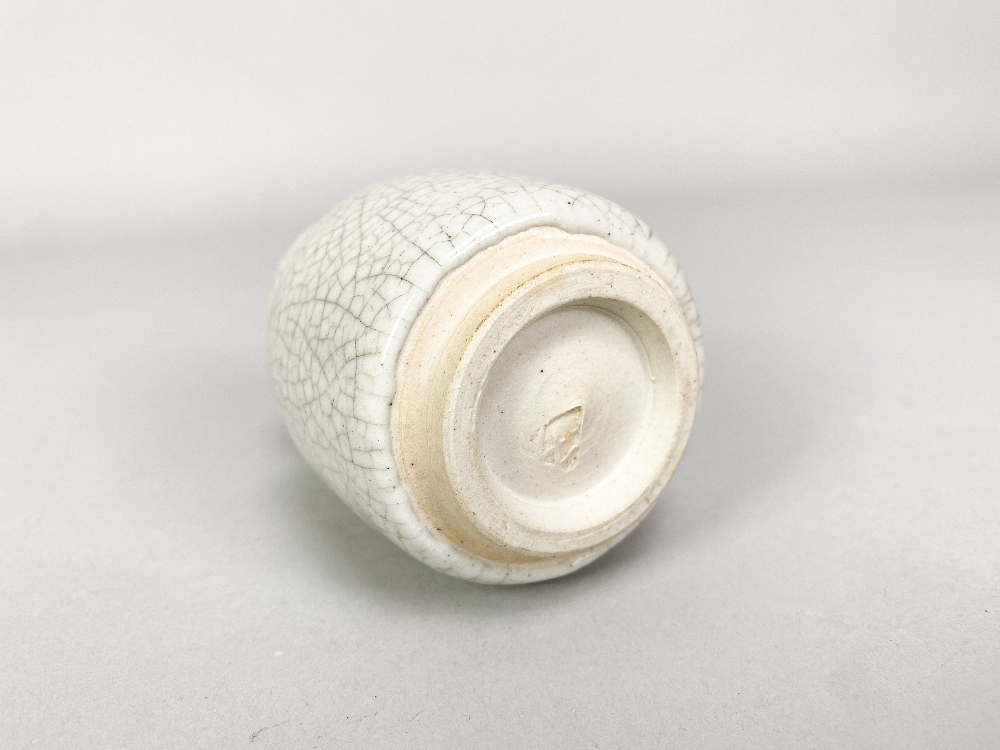 CONSTANCE DUNN; a small stoneware vase covered in white crackle glaze, impressed W mark, made - Image 4 of 5