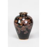 CHARLES VYSE (1882-1971); a stoneware vase with floral decoration on tenmoku ground, incised CV mark