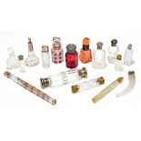 A collection of sixteen Victorian and later scent bottles, to include a facetted clear glass and