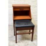 A mid-20th century teak telephone seat with single drawer above recess, height 69cm, width 42cm,