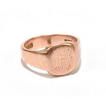 A gentleman's 9ct rose gold signet ring, the cartouche with engraved initials 'HH' (possibly),