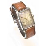 An early 20th century gentleman's hallmarked silver cased tank mechanical wristwatch, the