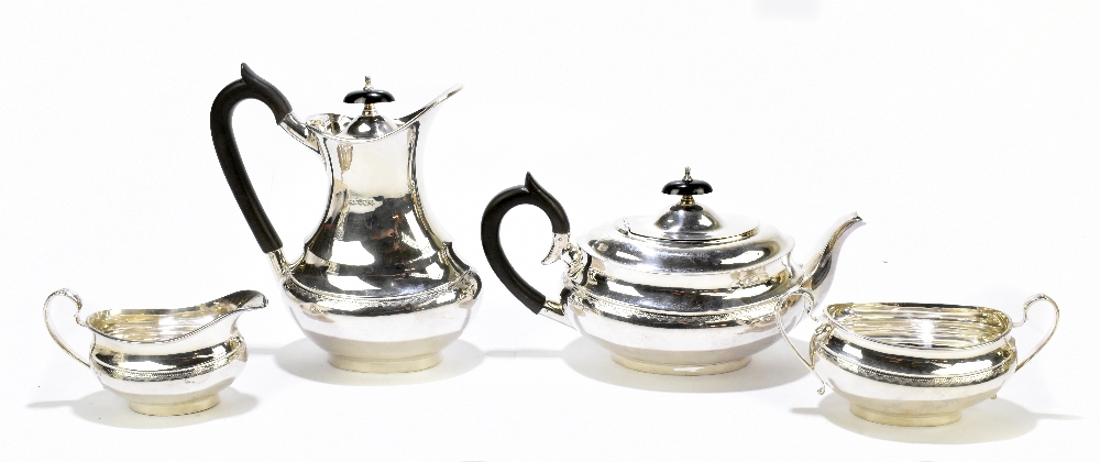 VINERS LTD; an Elizabeth II hallmarked silver four piece tea set, each of oval form with chased