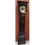 An early 20th century oak longcase clock, the brass face with silvered dial set with Roman and