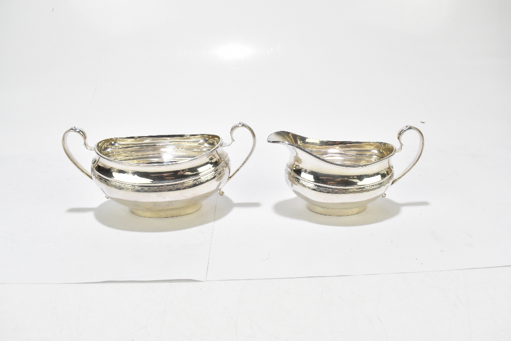 VINERS LTD; an Elizabeth II hallmarked silver four piece tea set, each of oval form with chased - Image 7 of 9