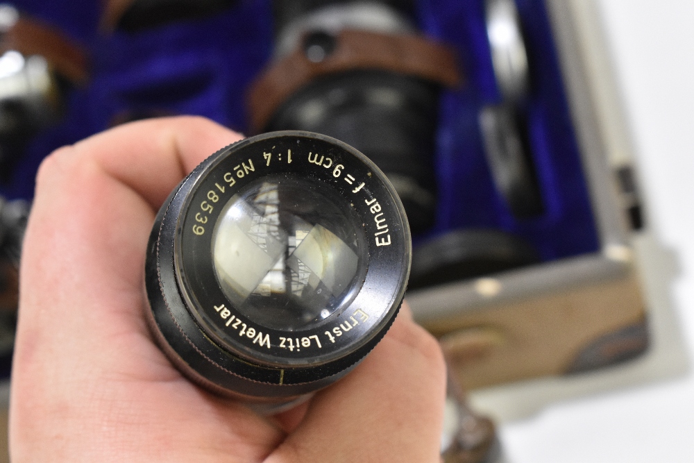 A cased set of camera lenses and equipment to include a Hektor F=13, 5cm lens, numbered 558913, - Image 6 of 8