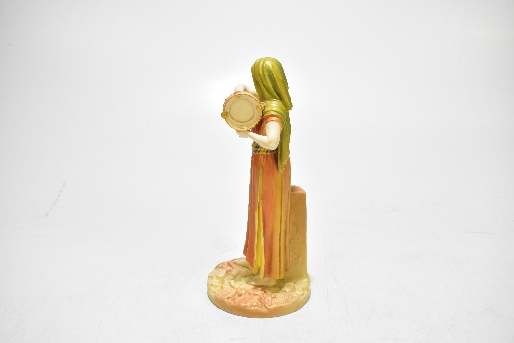 HADLEY ROYAL WORCESTER; a coloured blush ivory figure representing a maiden playing a tambourine, - Image 4 of 8