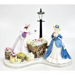 COALPORT; a large and impressive limited edition figure group, ‘The Flower Seller’, length 48cm,