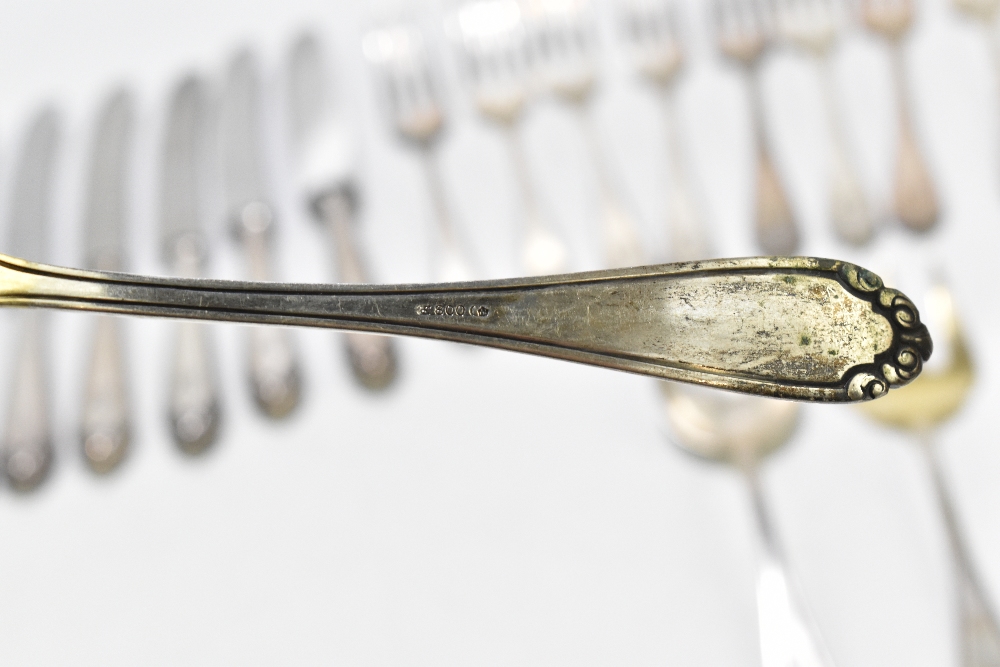 A German 800 grade thirty-two piece part canteen of cutlery each with cast floral detail, the - Image 6 of 12