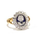 A Victorian style yellow gold ring set with diamonds with central blue enamel panel and floral