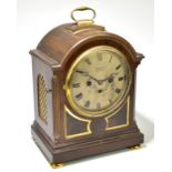 RUSSELL LTD; an early 20th century fusee eight day walnut bracket clock, the silvered dial set