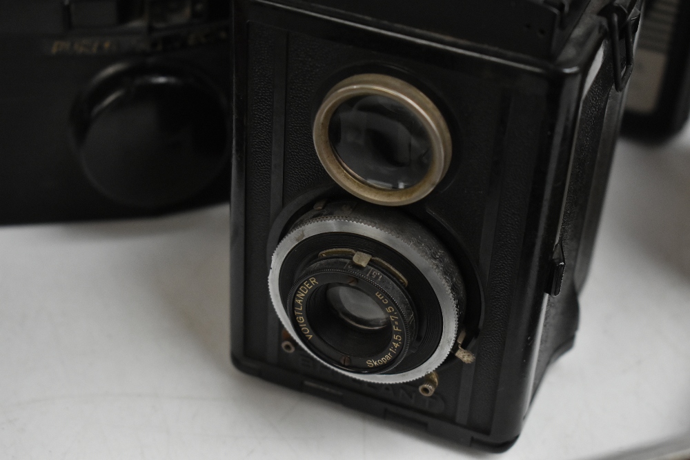 A group of vintage cameras comprising King Penguin bellows Kershaw Eight-20 (x2), Purma 'Plus', - Image 2 of 5
