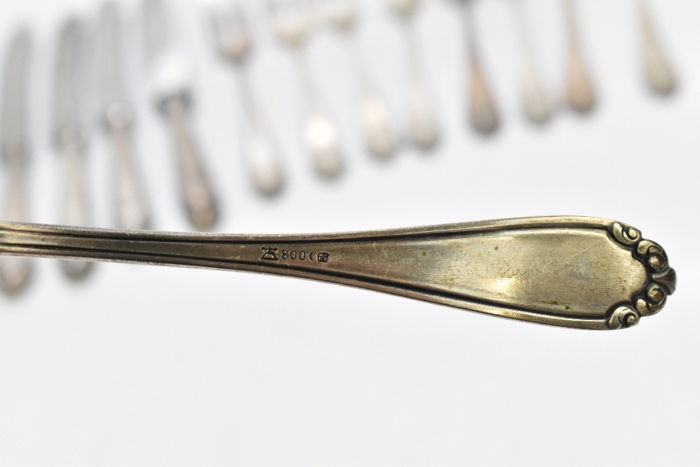 A German 800 grade thirty-two piece part canteen of cutlery each with cast floral detail, the - Image 8 of 12