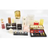 A set of sixteen boxed perfumes, mostly vintage, used and unused, including Salvador Dali,