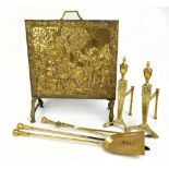 A 19th century brass three piece companion set, together with a pair of similar later firedogs and a