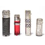 Four hallmarked silver mounted scent bottles, comprising a ruby glass scent bottle and stopper