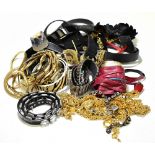 A group of vintage ladies' belts including leather and gilt metal examples.