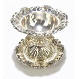 A late 19th century Russian silver pedestal bowl and stand, with cast floral sprays inside