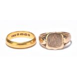 A 22ct yellow gold wedding band, size L 1/2, approx 4.5g and a 9ct yellow gold signet ring, size