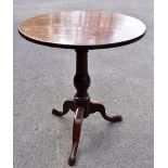 A Georgian mahogany tilt-top tripod occasional table, raised on outswept supports, height 72cm,