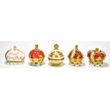 ROYAL CROWN DERBY; four limited edition paperweights comprising 'Queen Mother 100th Birthday Crown',