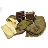 A WWI military full length wool coat, size 5, with a military cap, two knitted green wool hats and