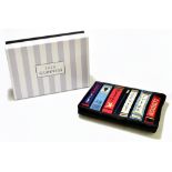 LULU GUINNESS; an unused brand new with box black satin 'library' zip top small clutch bag/makeup