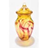 THOMAS PETIT; a contemporary lidded amber coloured glass jar with internal mottled detail, signed to