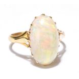 An 18ct yellow gold and large opal ring with pierced shoulders, size S, approx 6.2g.Additional