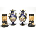 A pair of late 19th/early 20th century Continental ceramic twin handled vases with gilt heightened