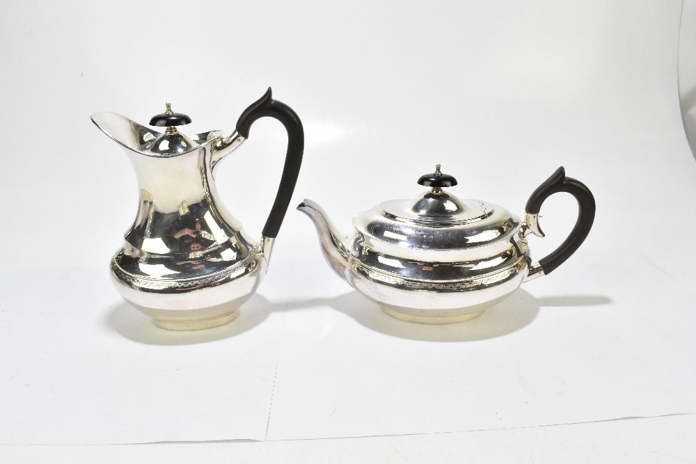 VINERS LTD; an Elizabeth II hallmarked silver four piece tea set, each of oval form with chased - Image 6 of 9