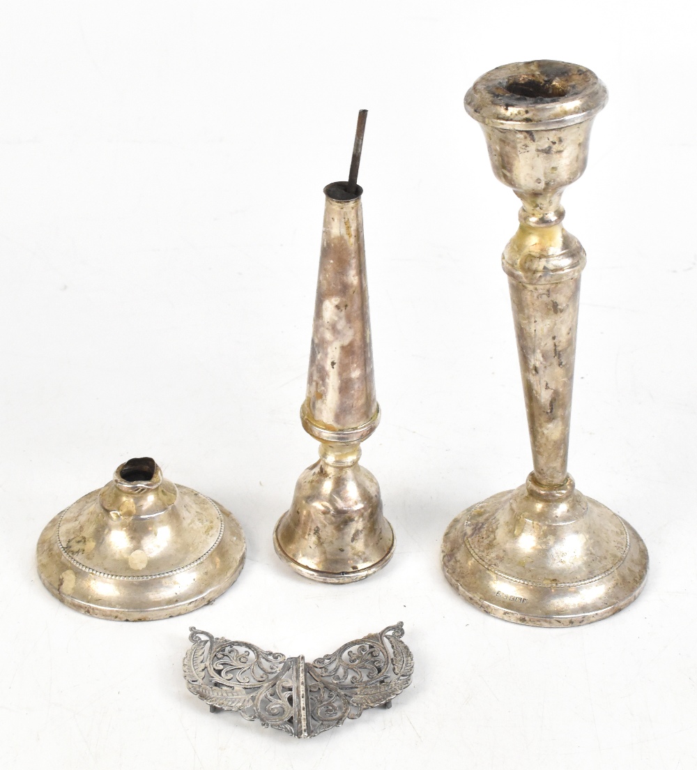 A T CANNON LTD; a pair of Elizabeth II hallmarked silver candlesticks, with cast beaded foot rims,