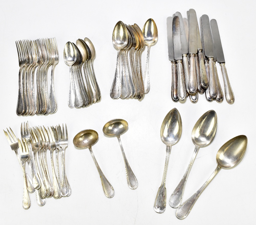 A German 800 grade silver sixty-five piece service, each with cast detail to the handles, comprising