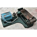 A Linisher sander, cast with maker's name Ahcol.Additional InformationGeneral age wear, tarnishing