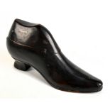 A wooden novelty table snuff box modelled as a boot, length 18cm.Additional InformationScratches,