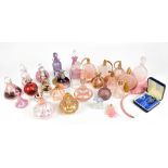 SCENT BOTTLES; twenty-five scent bottles of different sizes, shapes and colours, mainly pink and