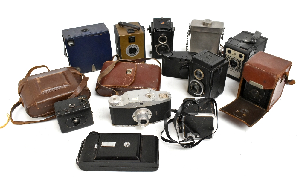 A group of vintage cameras comprising King Penguin bellows Kershaw Eight-20 (x2), Purma 'Plus',