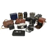 A group of vintage cameras comprising King Penguin bellows Kershaw Eight-20 (x2), Purma 'Plus',