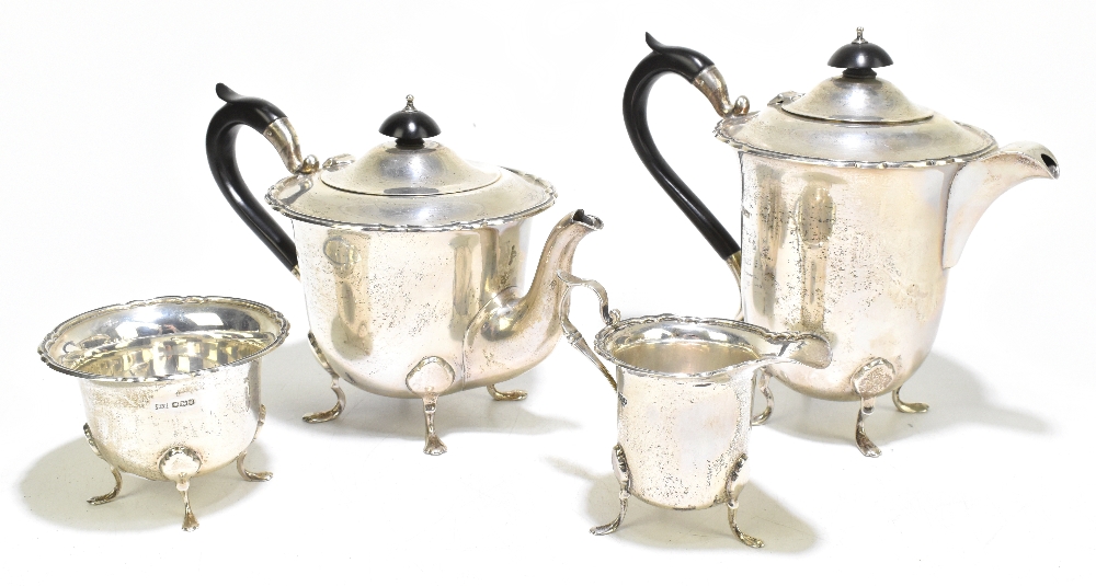 WALKER & HALL; a George V hallmarked silver four piece tea set, Sheffield 1938, 1933 and 1934,