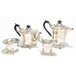 WALKER & HALL; a George V hallmarked silver four piece tea set, Sheffield 1938, 1933 and 1934,