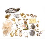 A collection of costume jewellery including cameo brooch, locket, compact, simulated pearls, brooch,