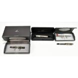 PARKER; a cased bakelite fountain pen with 18ct gold Duofold nib, two further examples with 18ct