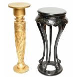 A Chinese black lacquered jardinière stand, with carved pierced detail, raised on six cabriole