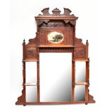 An early 20th century overmantel mirror with carved foliate detail, height 143cm, width 96cm.