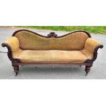 A William IV carved mahogany scroll end settee, on turned legs with fitted brass castors, height