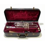 BESSON & CO; a nickel plated trumpet, serial number 128569, fitted in a faux crocodile skin case.