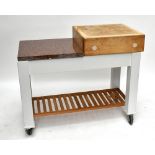 STEPHEN NEALL OF HARROGATE; a butcher's block on painted stand, the square section block sitting