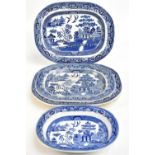 Four 19th century and later blue and white meat plates decorated in the 'Willow' pattern, together