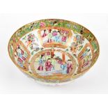 A 19th century Chinese Canton Famille Rose bowl painted with figures to both the interior and