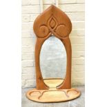 A modern elm dressing table mirror of shaped rectangular form, the base section with three